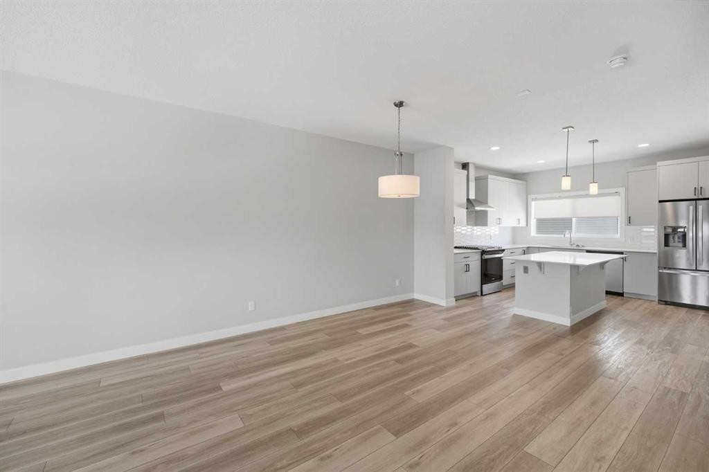 125 Edith Gate Nw, Calgary, AB - Indoor Photo Showing Kitchen With Stainless Steel Kitchen With Upgraded Kitchen