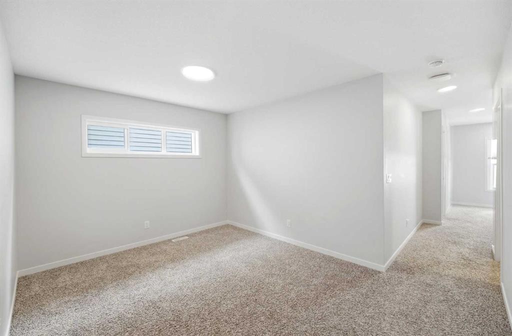 34 Aquila Way Nw, Calgary, AB - Indoor Photo Showing Other Room