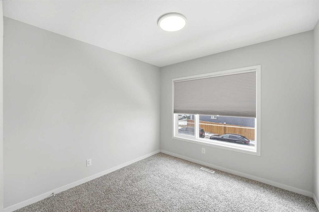 34 Aquila Way Nw, Calgary, AB - Indoor Photo Showing Other Room