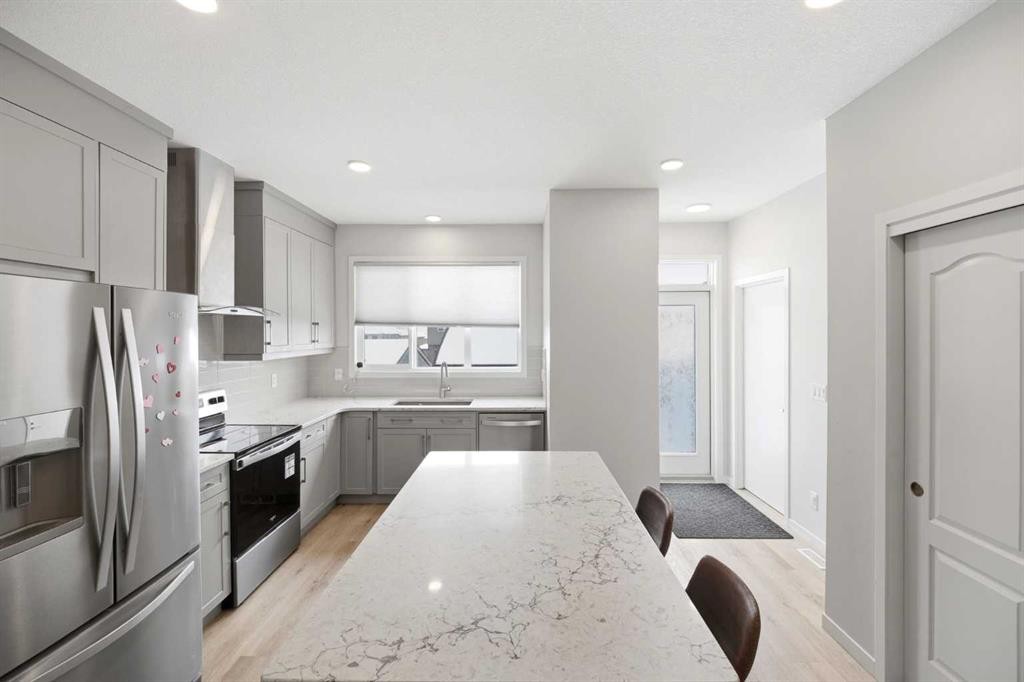 34 Aquila Way Nw, Calgary, AB - Indoor Photo Showing Kitchen With Stainless Steel Kitchen