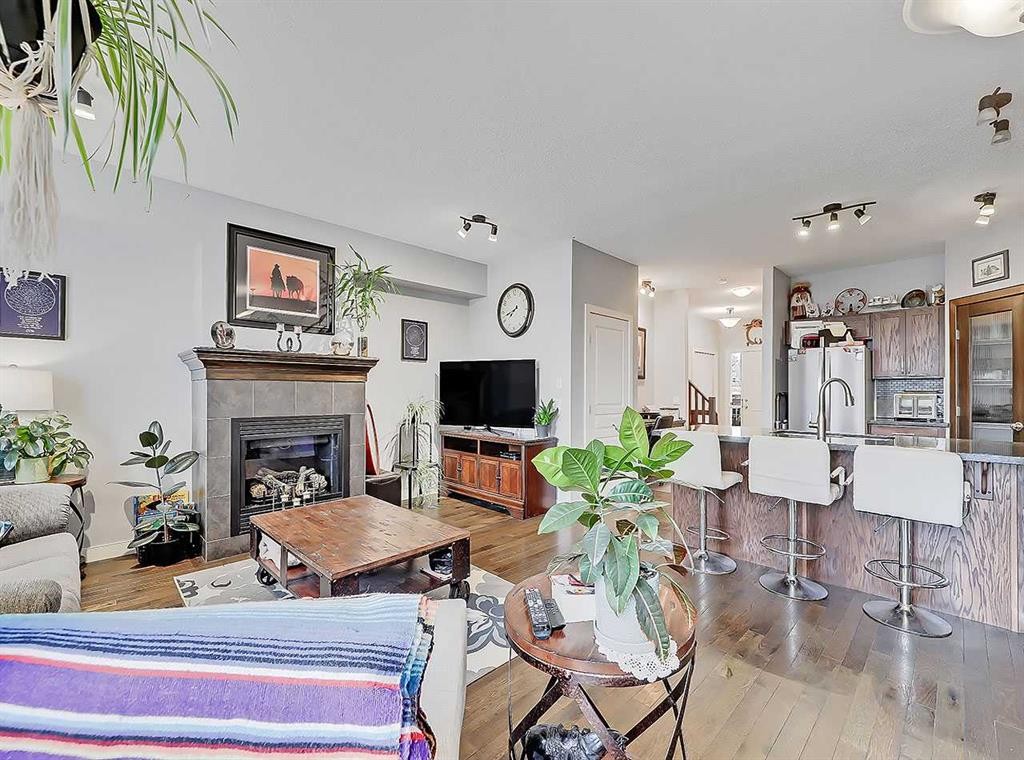 32-351 Monteith Drive Se, High River, AB - Indoor Photo Showing Living Room With Fireplace