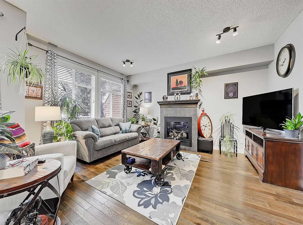 32-351 Monteith Drive Se, High River, AB - Indoor Photo Showing Living Room With Fireplace