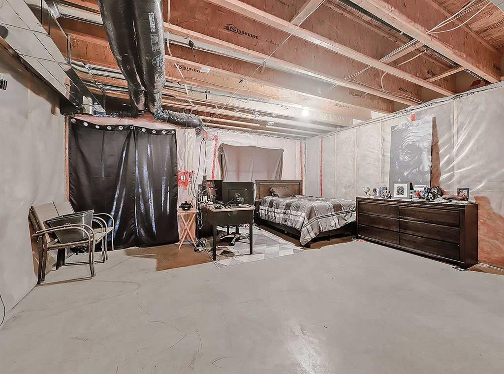 32-351 Monteith Drive Se, High River, AB - Indoor Photo Showing Basement