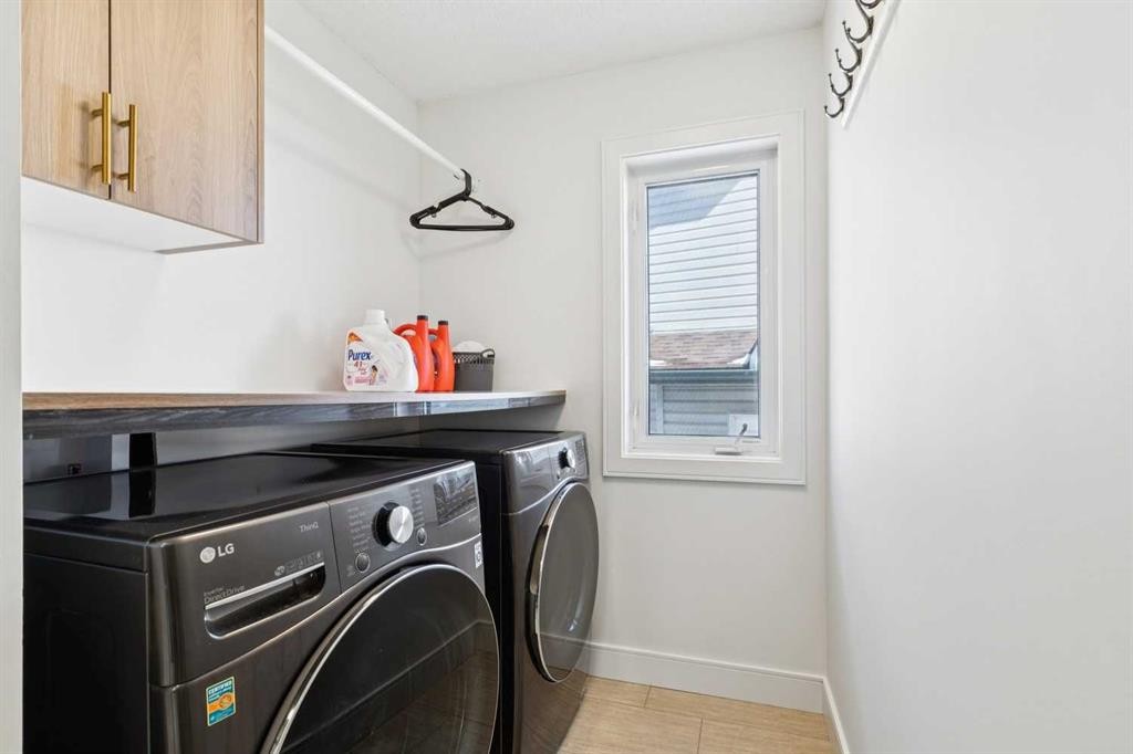 642 Schooner Cove Nw, Calgary, AB - Indoor Photo Showing Laundry Room