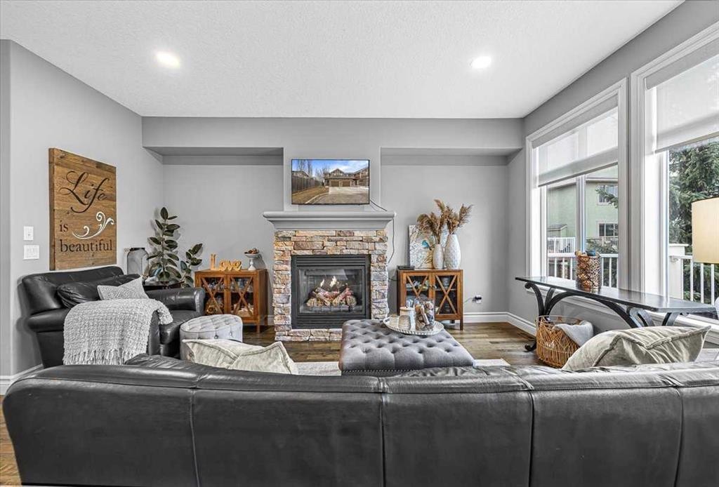 26-351 Monteith Drive Se, High River, AB - Indoor Photo Showing Living Room With Fireplace