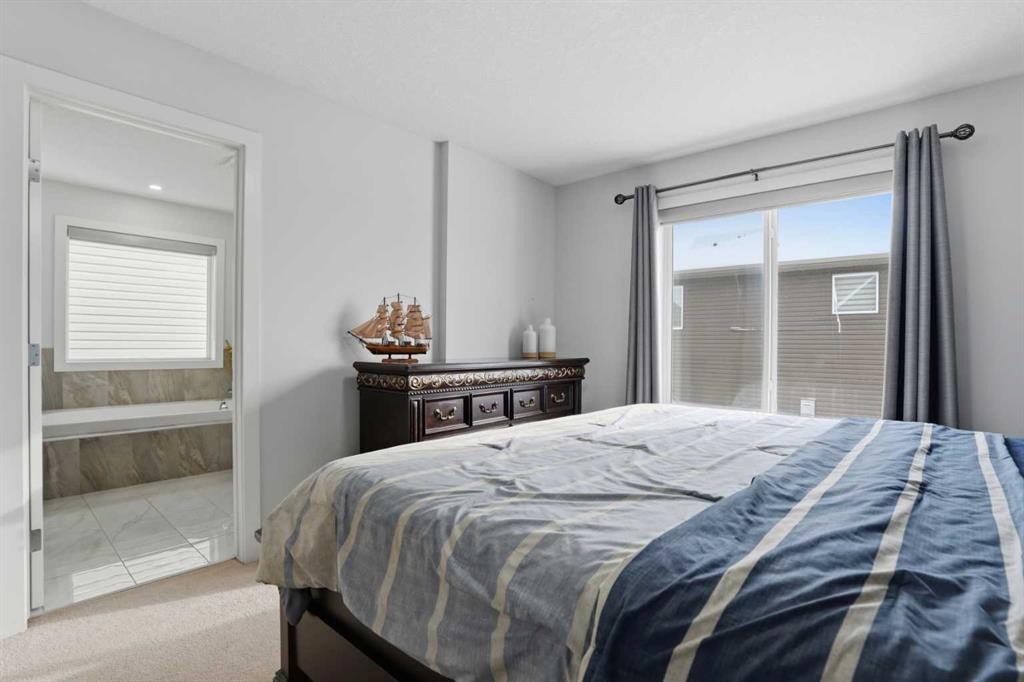 154 Saddlelake Way Ne, Calgary, AB - Indoor Photo Showing Bedroom