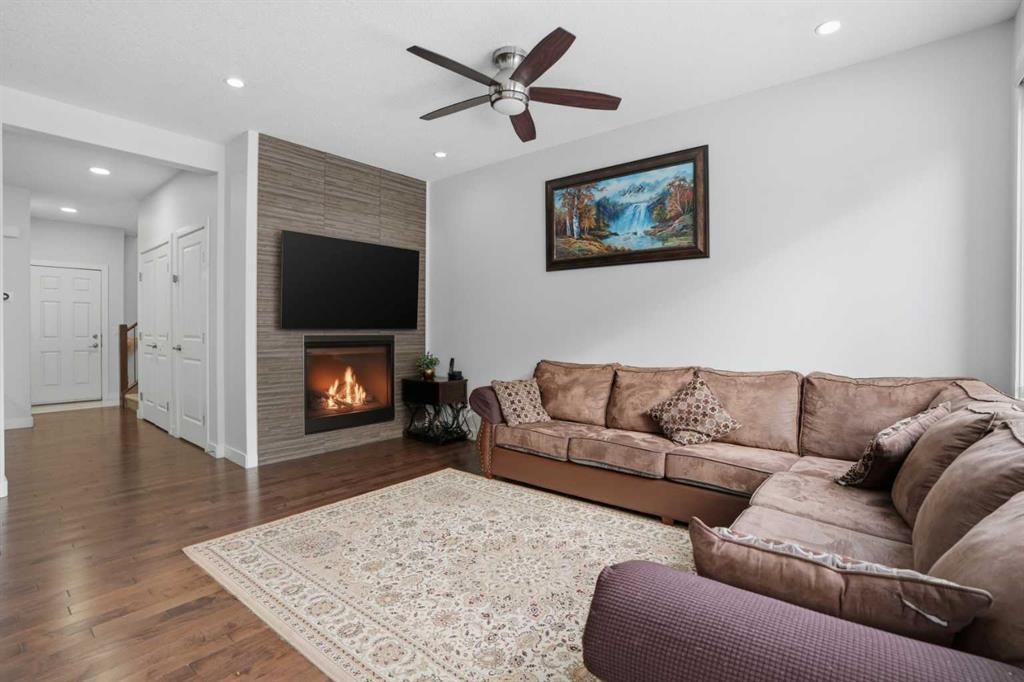 154 Saddlelake Way Ne, Calgary, AB - Indoor Photo Showing Living Room With Fireplace