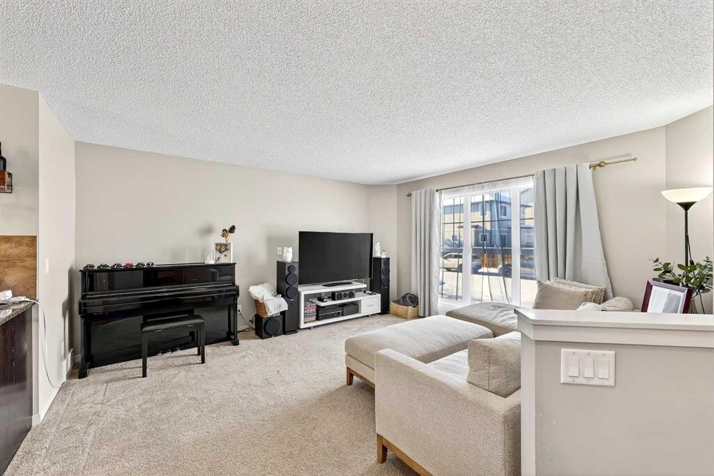 336 Cranberry Circle Se, Calgary, AB - Indoor Photo Showing Living Room