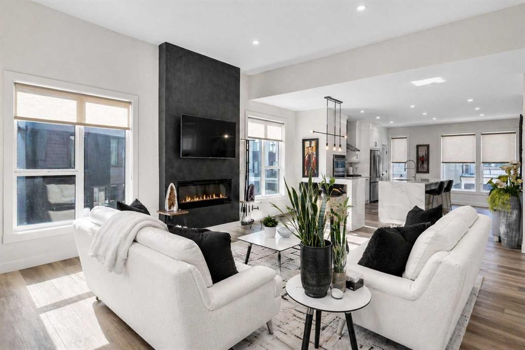 244 Sovereign Common Sw, Calgary, AB - Indoor Photo Showing Living Room With Fireplace
