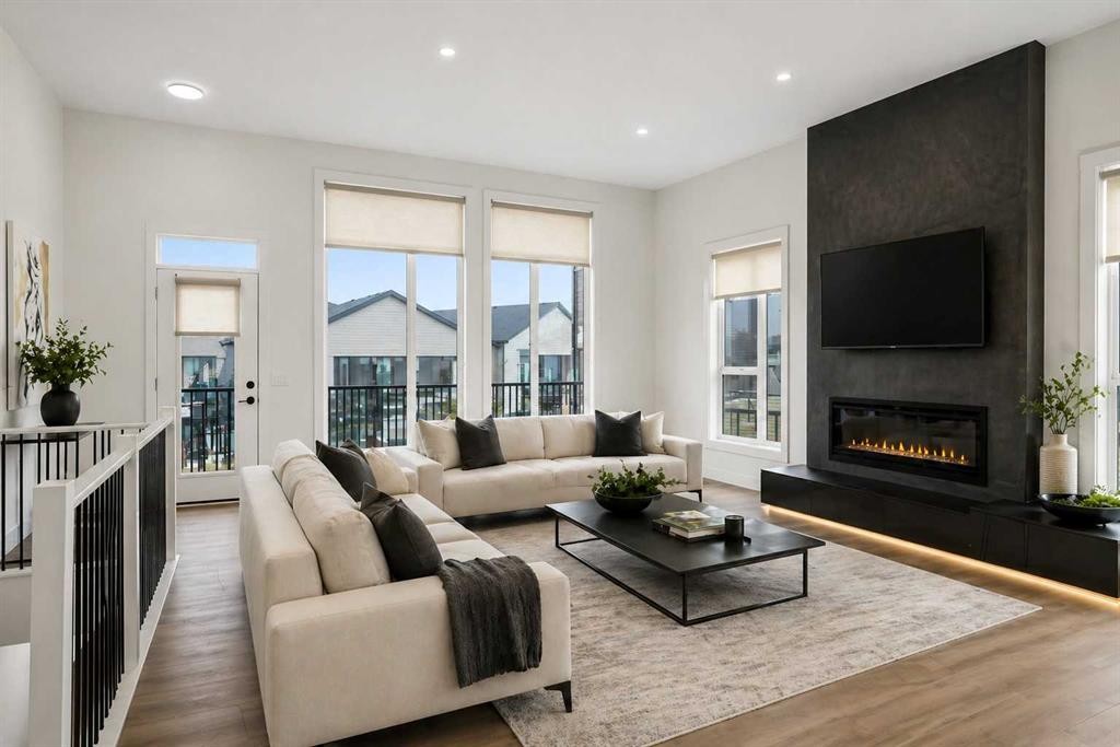 244 Sovereign Common Sw, Calgary, AB - Indoor Photo Showing Living Room With Fireplace