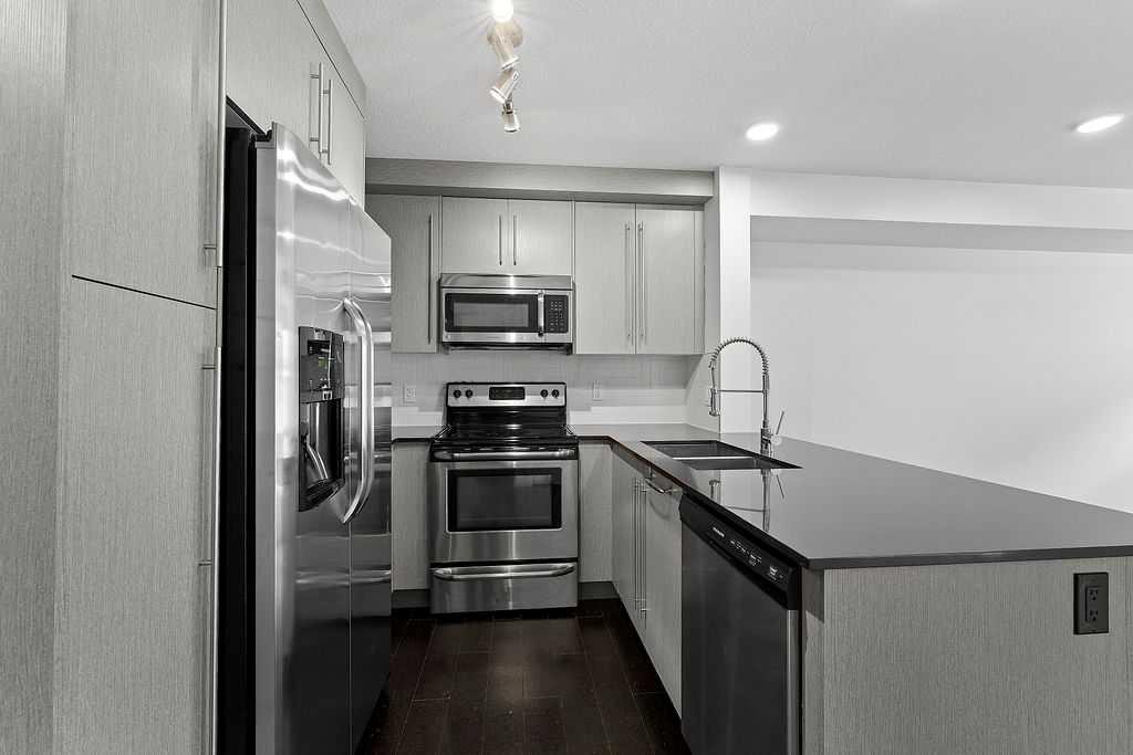 2408-11 Mahogany Row Se, Calgary, AB - Indoor Photo Showing Kitchen With Double Sink With Upgraded Kitchen