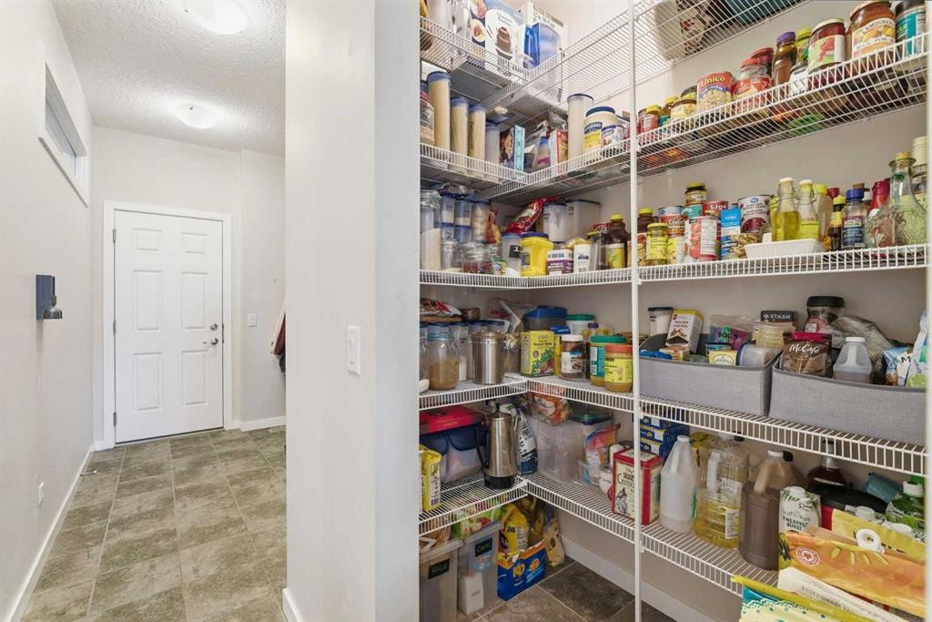 52 Walden Green Se, Calgary, AB - Indoor With Storage