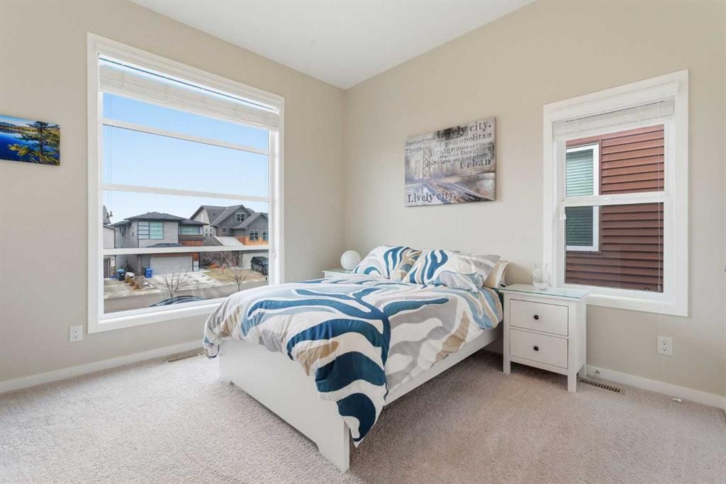 52 Walden Green Se, Calgary, AB - Indoor Photo Showing Bedroom