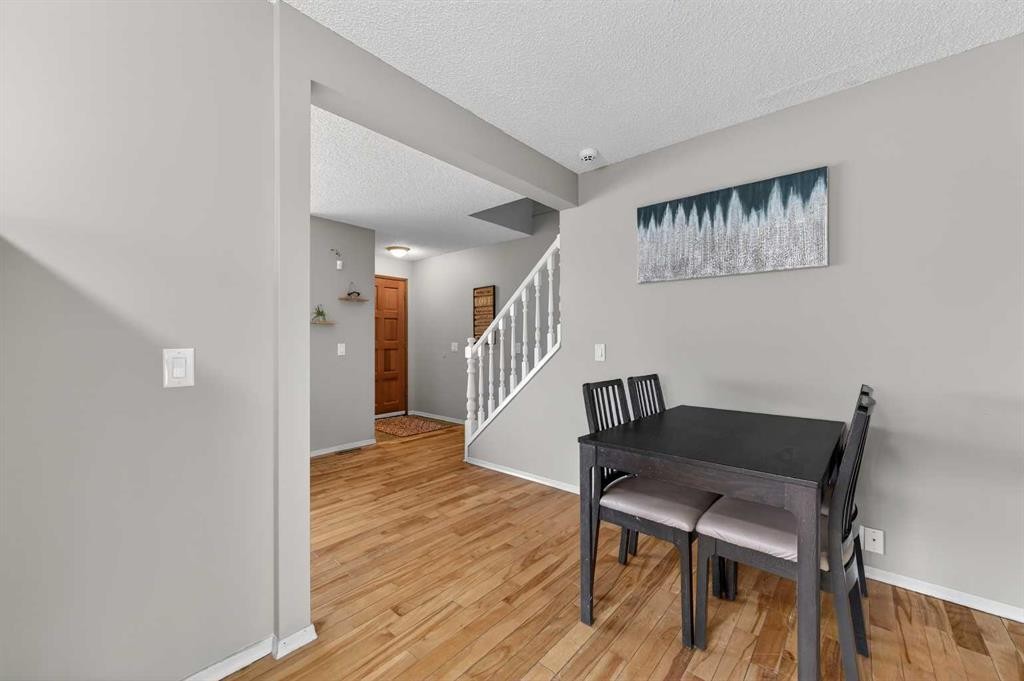 103 Macewan Drive Nw, Calgary, AB - Indoor Photo Showing Dining Room
