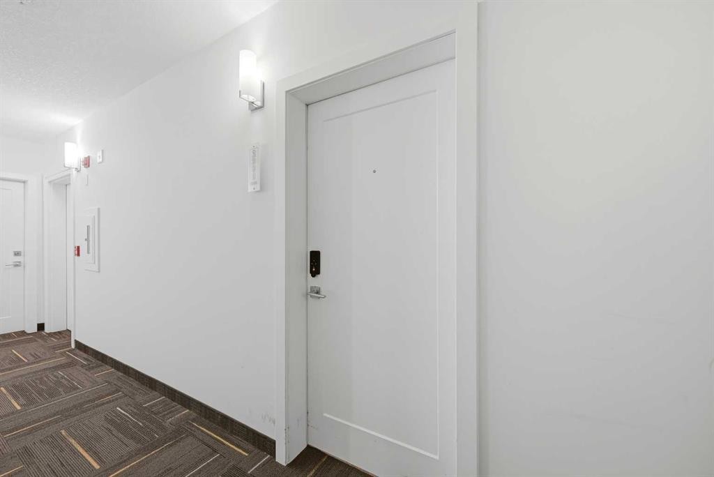 2303-76 Cornerstone Passage Ne, Calgary, AB - Indoor Photo Showing Other Room