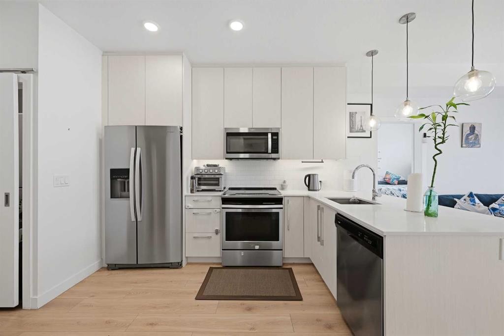 2303-76 Cornerstone Passage Ne, Calgary, AB - Indoor Photo Showing Kitchen With Stainless Steel Kitchen With Upgraded Kitchen