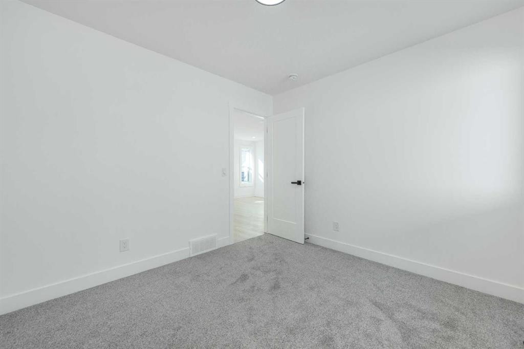 43 Saddlecrest Link Ne, Calgary, AB - Indoor Photo Showing Other Room