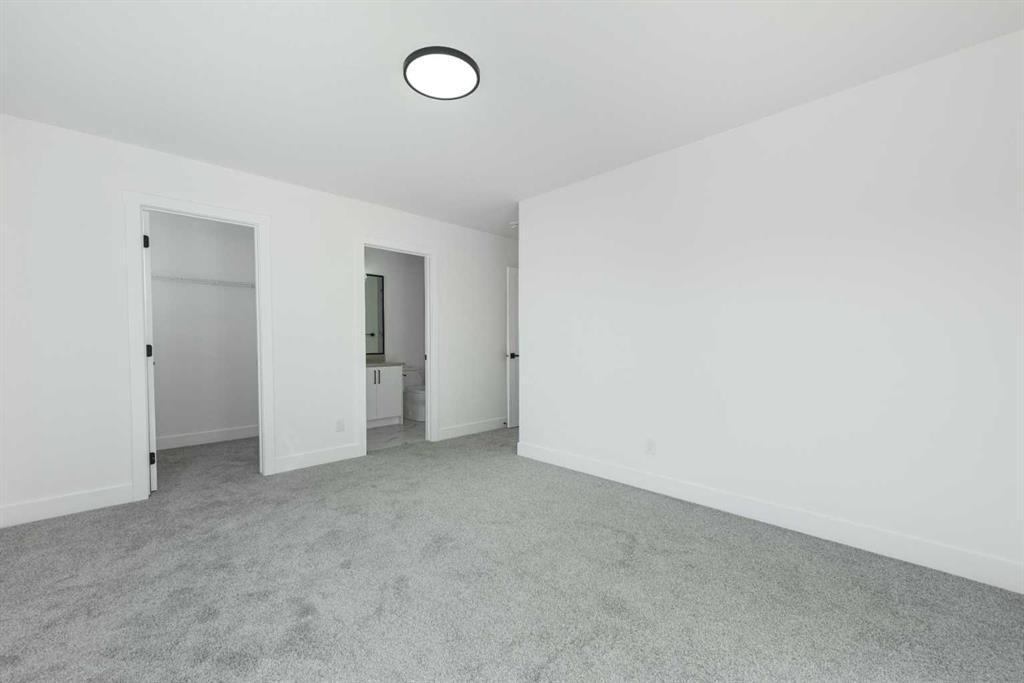 43 Saddlecrest Link Ne, Calgary, AB - Indoor Photo Showing Other Room