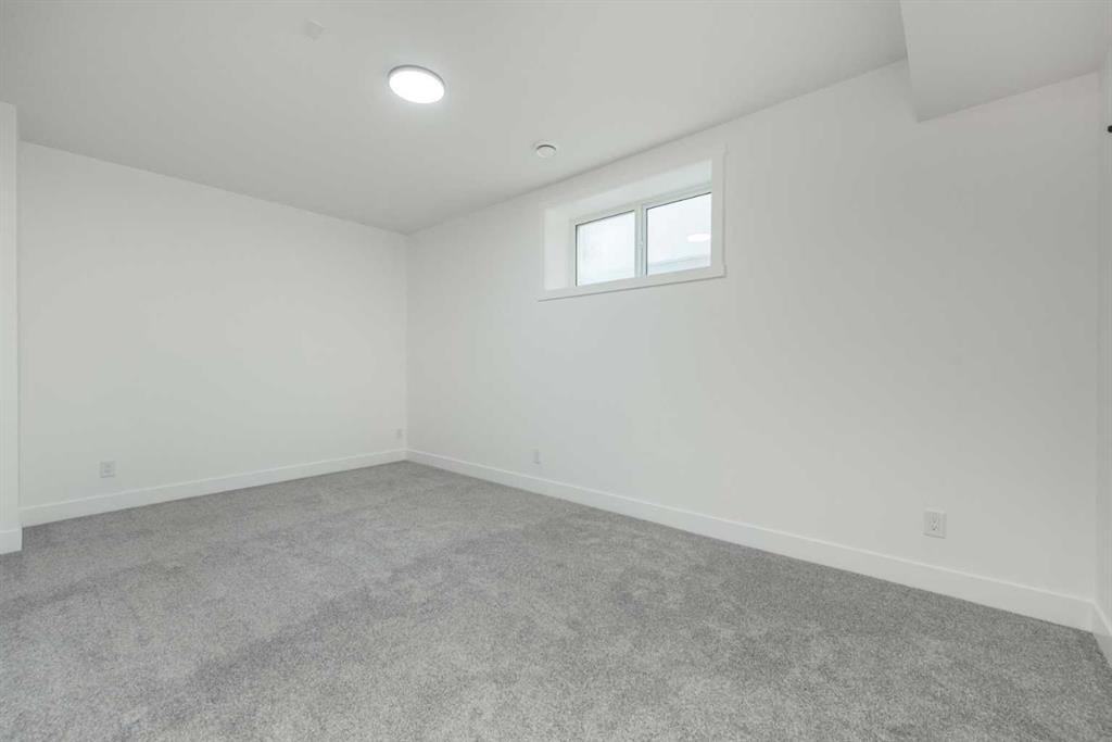 43 Saddlecrest Link Ne, Calgary, AB - Indoor Photo Showing Other Room
