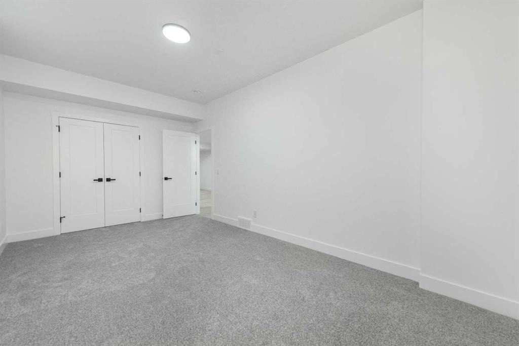 43 Saddlecrest Link Ne, Calgary, AB - Indoor Photo Showing Other Room