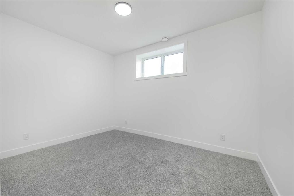 43 Saddlecrest Link Ne, Calgary, AB - Indoor Photo Showing Other Room