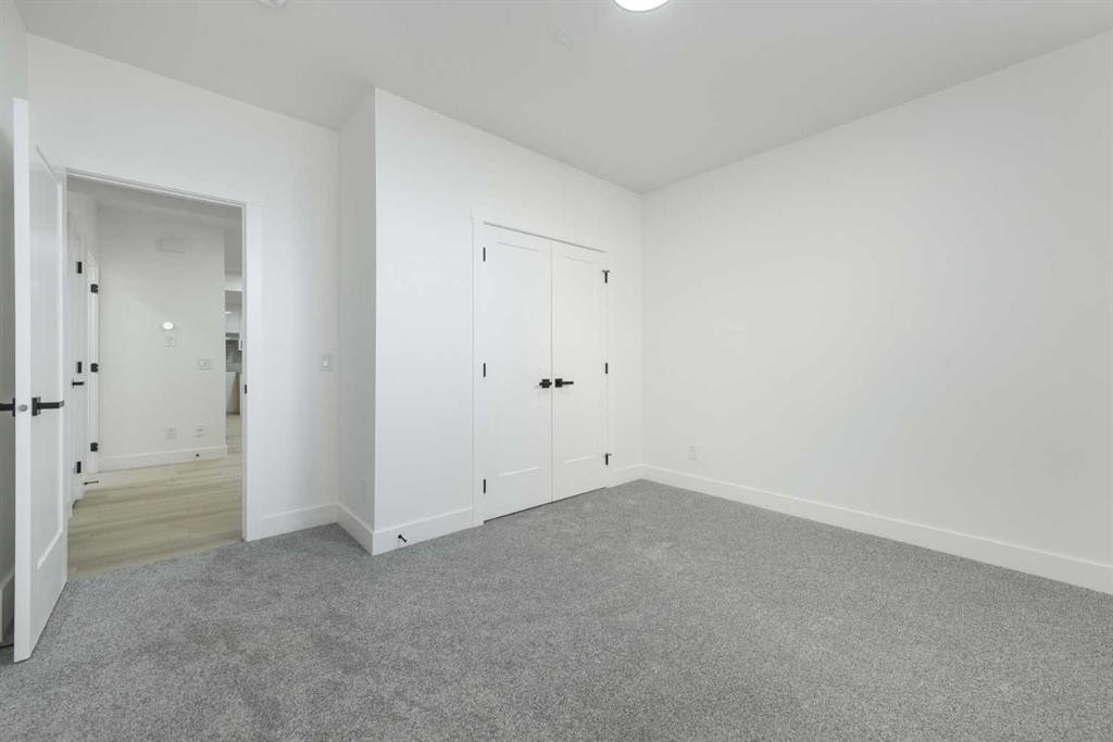 43 Saddlecrest Link Ne, Calgary, AB - Indoor Photo Showing Other Room