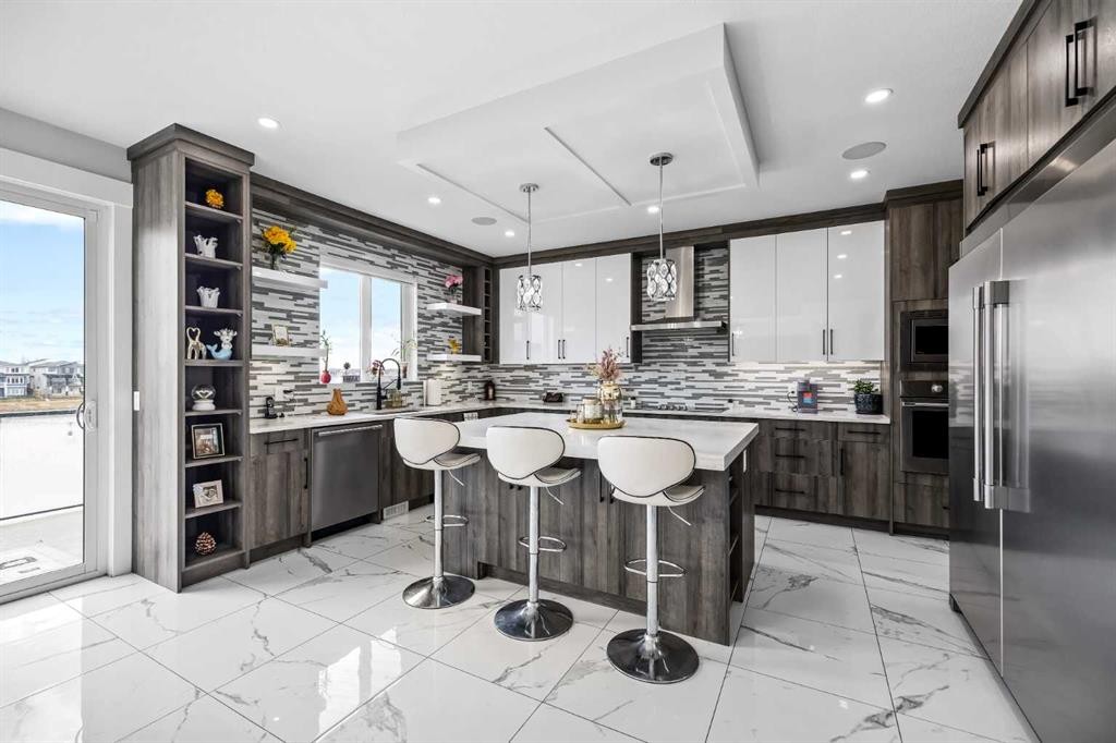 45 Waterford Terrace, Chestermere, AB - Indoor Photo Showing Kitchen With Upgraded Kitchen