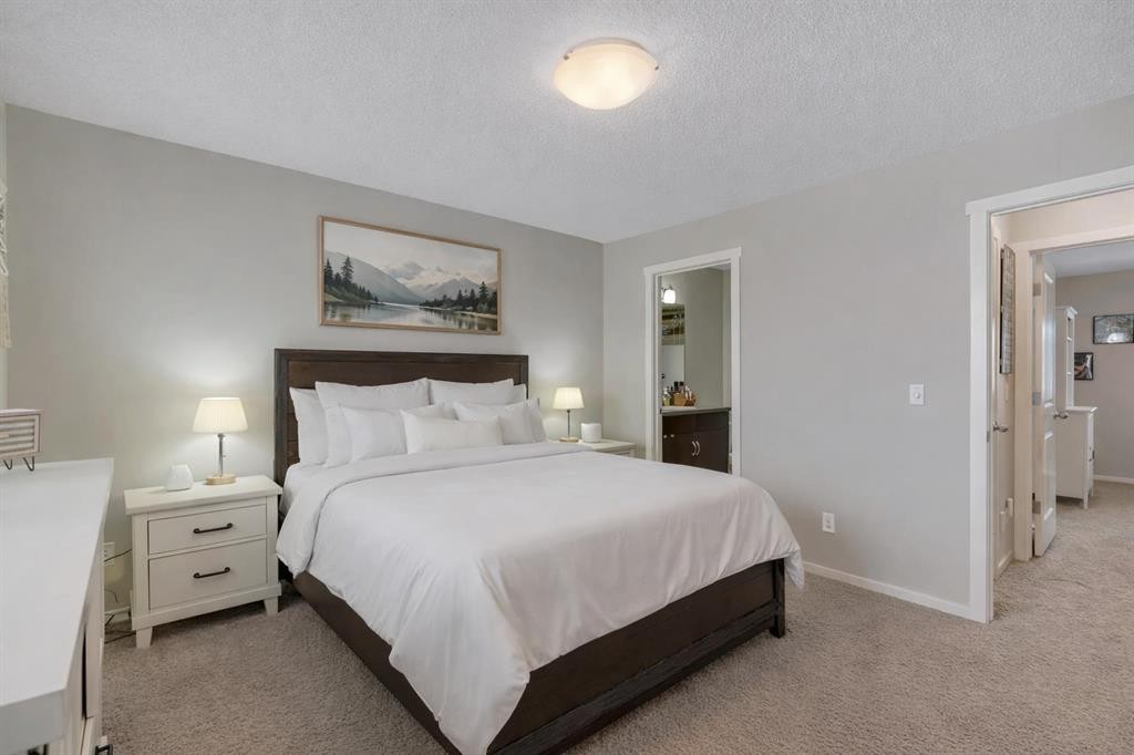 124 Panamount Way Nw, Calgary, AB - Indoor Photo Showing Bedroom