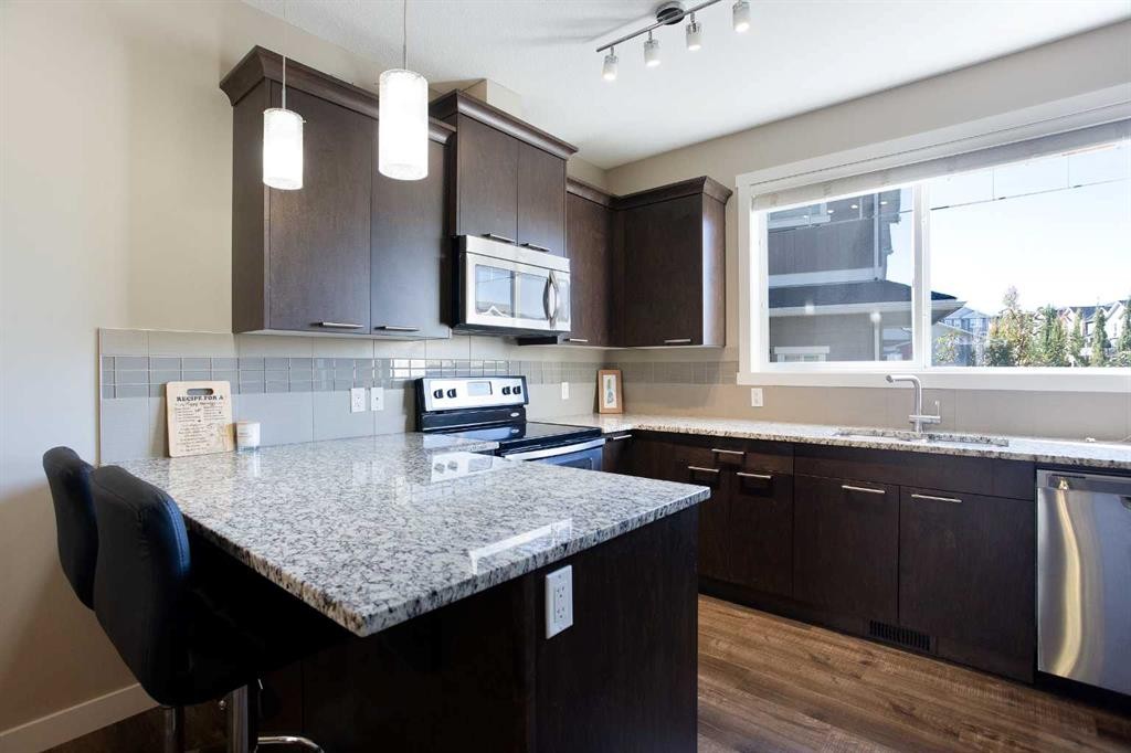 107 Evanston Manor Nw, Calgary, AB - Indoor Photo Showing Kitchen With Upgraded Kitchen