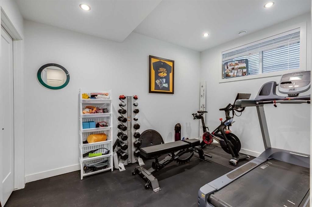 44 Timberline Way Sw, Calgary, AB - Indoor Photo Showing Gym Room