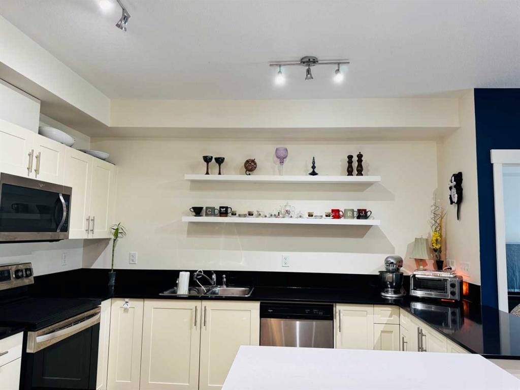 3313-99 Copperstone Park, Calgary, AB - Indoor Photo Showing Kitchen With Stainless Steel Kitchen With Double Sink