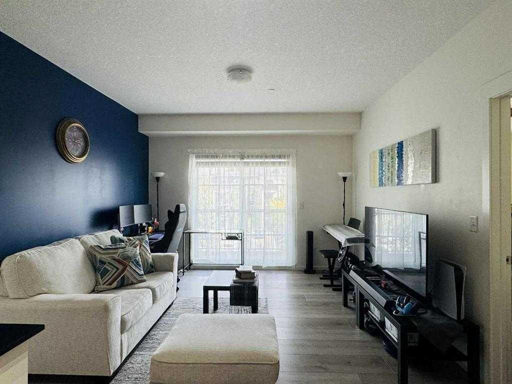 3313-99 Copperstone Park, Calgary, AB - Indoor Photo Showing Living Room