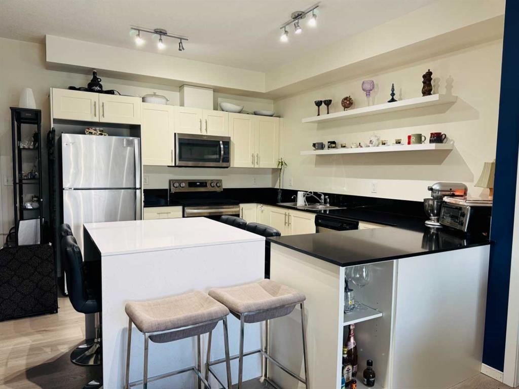 3313-99 Copperstone Park, Calgary, AB - Indoor Photo Showing Kitchen With Stainless Steel Kitchen