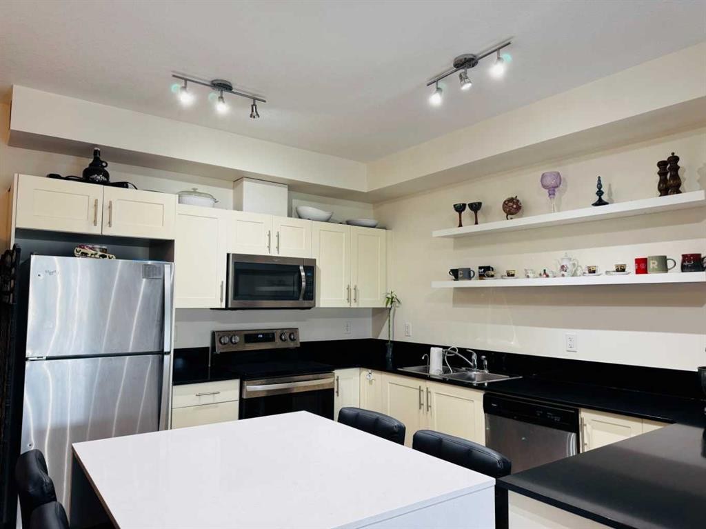 3313-99 Copperstone Park, Calgary, AB - Indoor Photo Showing Kitchen With Stainless Steel Kitchen With Double Sink