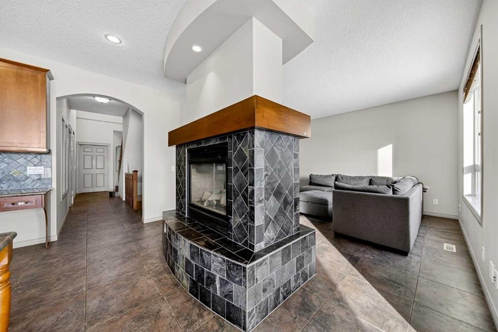 14 Springborough Crescent Sw, Calgary, AB - Indoor Photo Showing Living Room With Fireplace