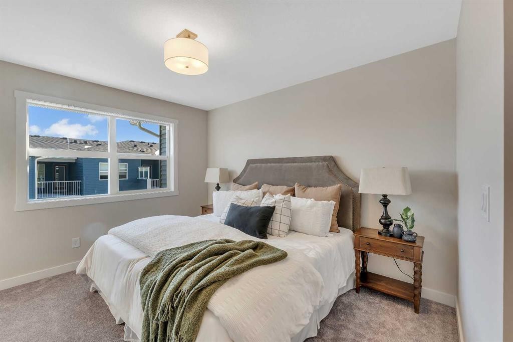 1047 Bayview Crescent, Airdrie, AB - Indoor Photo Showing Bedroom