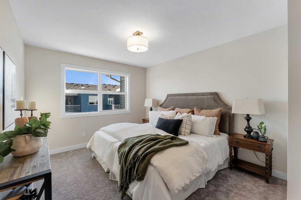 1047 Bayview Crescent, Airdrie, AB - Indoor Photo Showing Bedroom