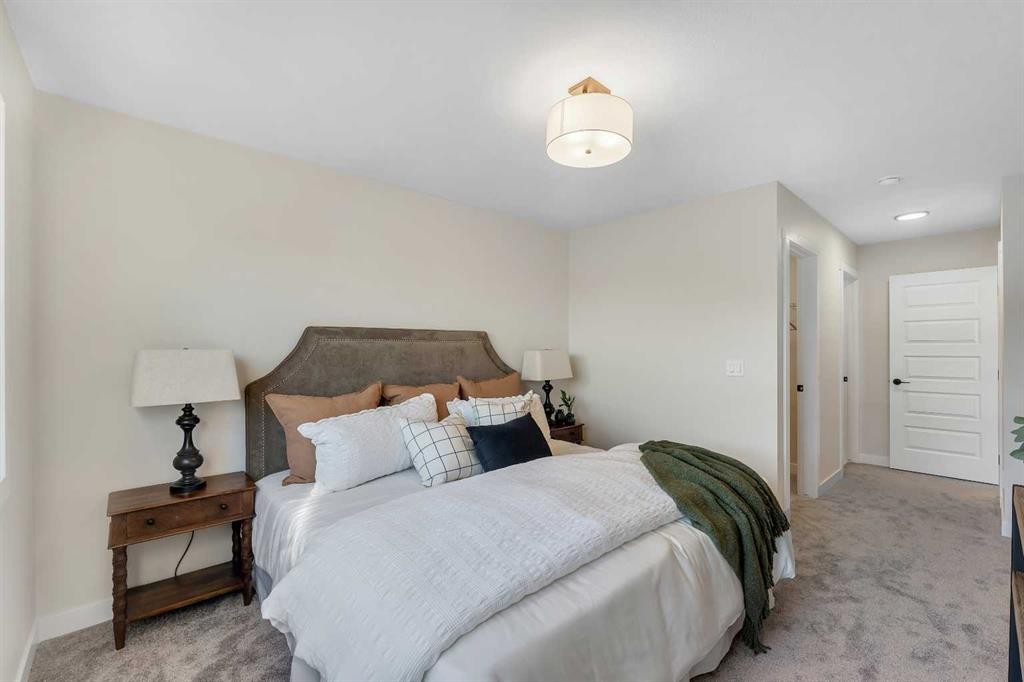 1047 Bayview Crescent, Airdrie, AB - Indoor Photo Showing Bedroom