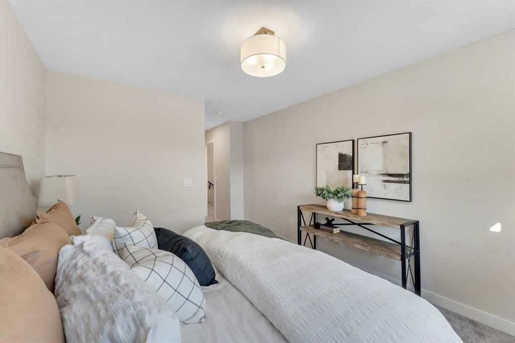 1047 Bayview Crescent, Airdrie, AB - Indoor Photo Showing Bedroom