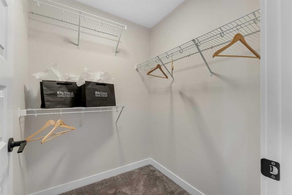 1047 Bayview Crescent, Airdrie, AB - Indoor With Storage