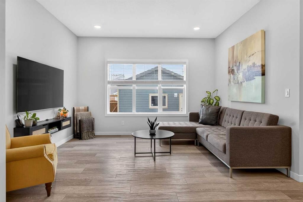 321 Magnolia Way Se, Calgary, AB - Indoor Photo Showing Living Room