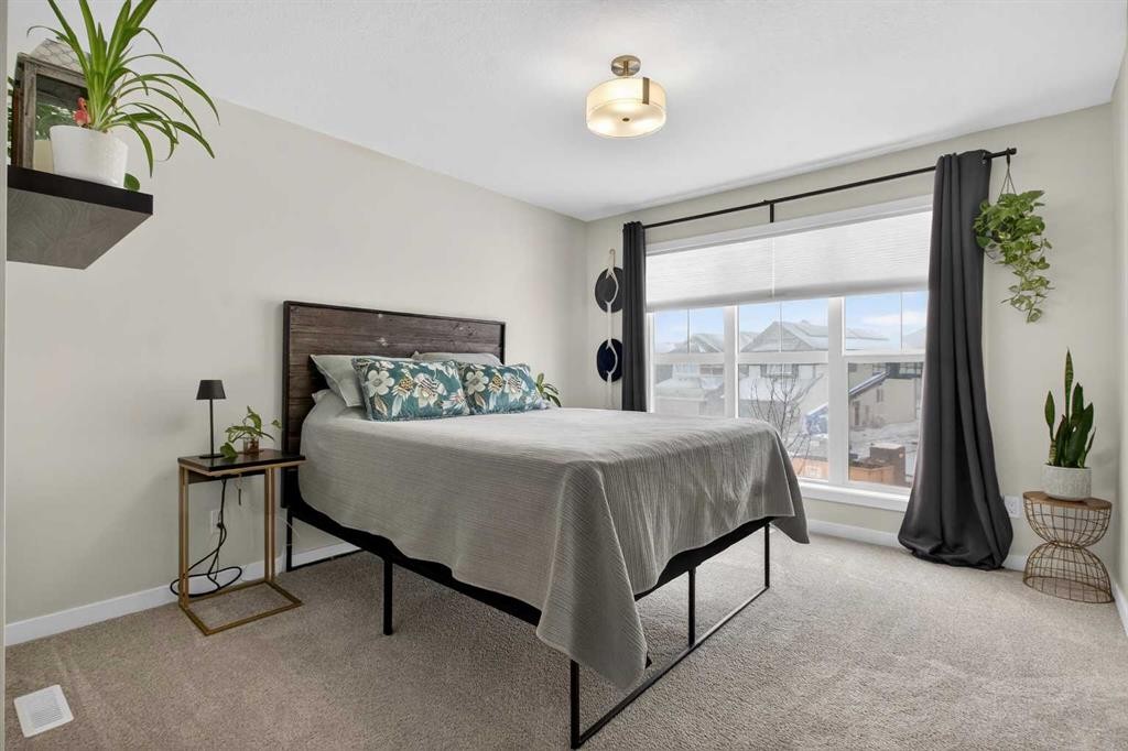321 Magnolia Way Se, Calgary, AB - Indoor Photo Showing Bedroom