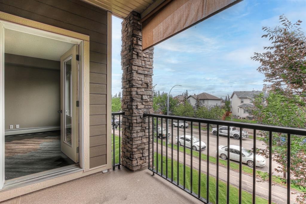 208-100 Cranfield Common Se, Calgary, AB - Outdoor With Balcony With Exterior