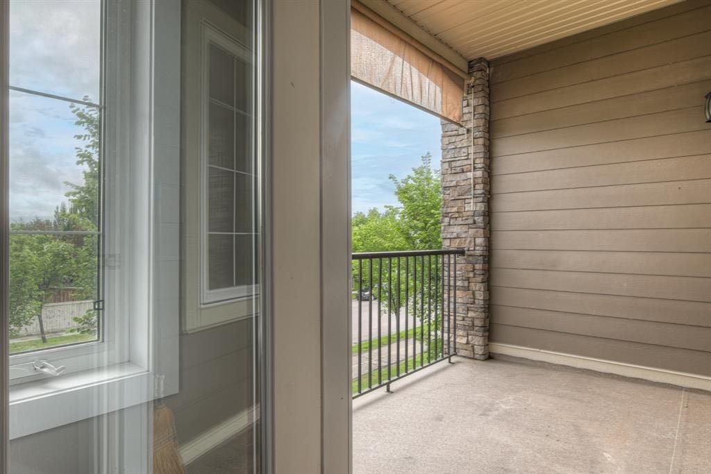 208-100 Cranfield Common Se, Calgary, AB - Outdoor With Balcony With Exterior