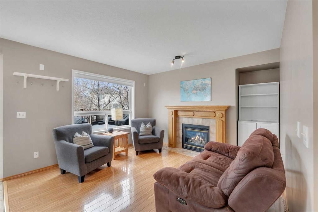 52 Covewood Green Ne, Calgary, AB - Indoor Photo Showing Living Room With Fireplace