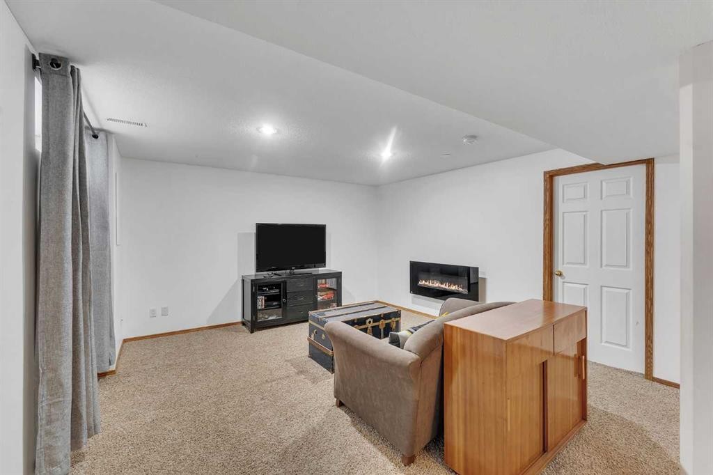 52 Covewood Green Ne, Calgary, AB - Indoor With Fireplace