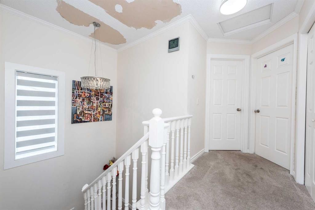 39 Tararidge Drive Ne, Calgary, AB - Indoor Photo Showing Other Room