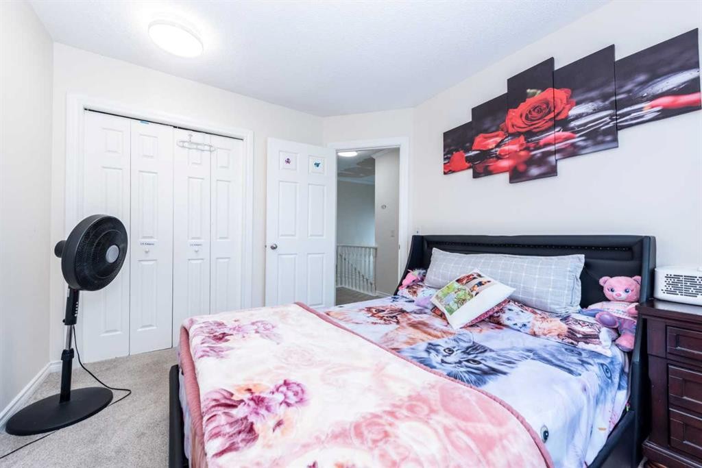 39 Tararidge Drive Ne, Calgary, AB - Indoor Photo Showing Bedroom