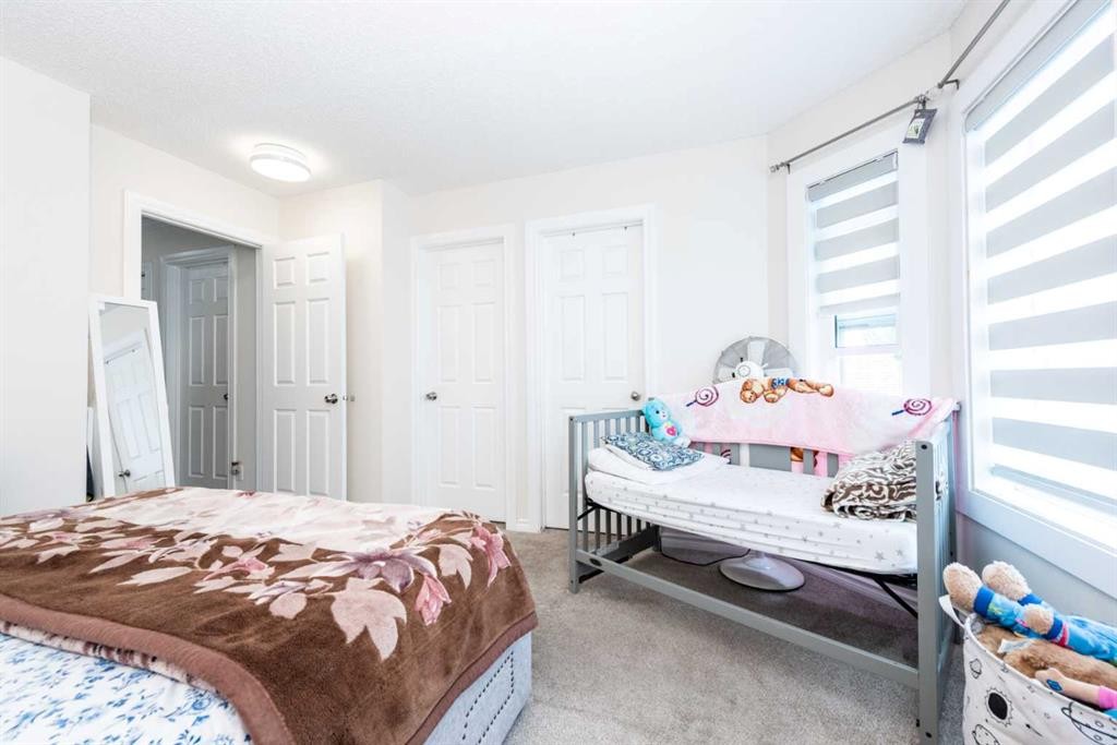 39 Tararidge Drive Ne, Calgary, AB - Indoor Photo Showing Bedroom