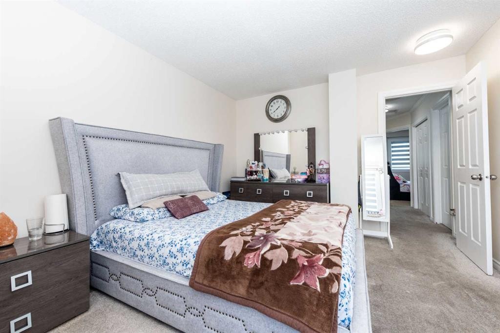 39 Tararidge Drive Ne, Calgary, AB - Indoor Photo Showing Bedroom